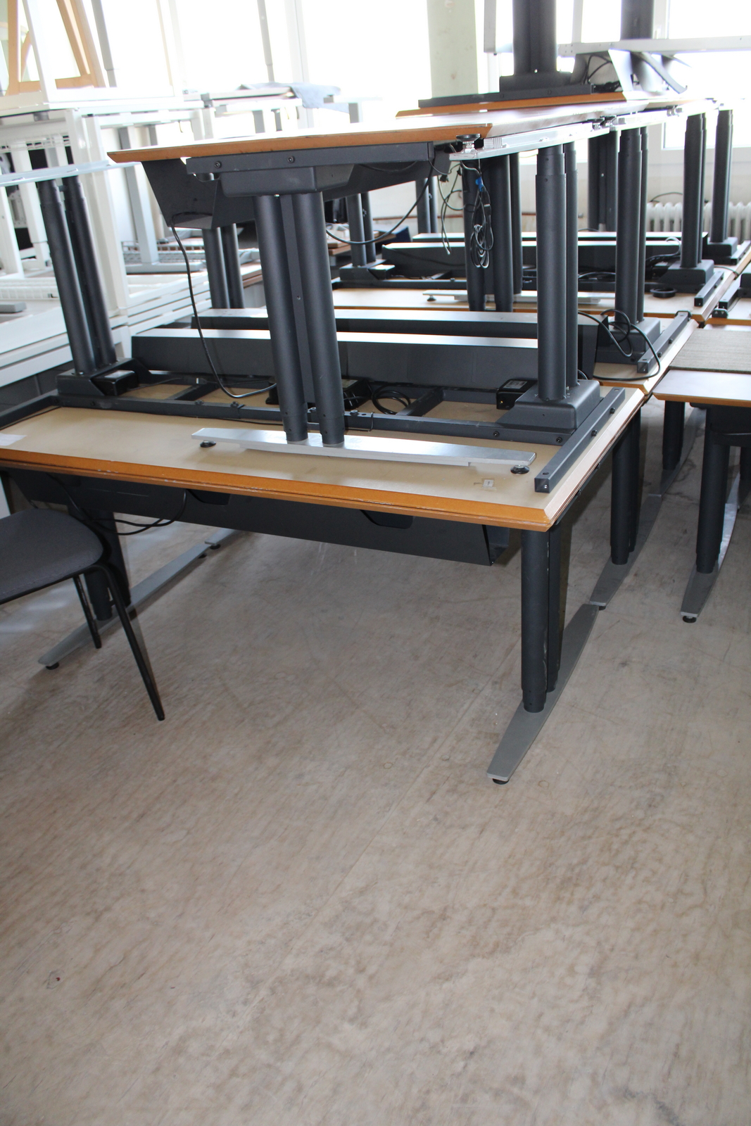 Electric height-adjustable table 10