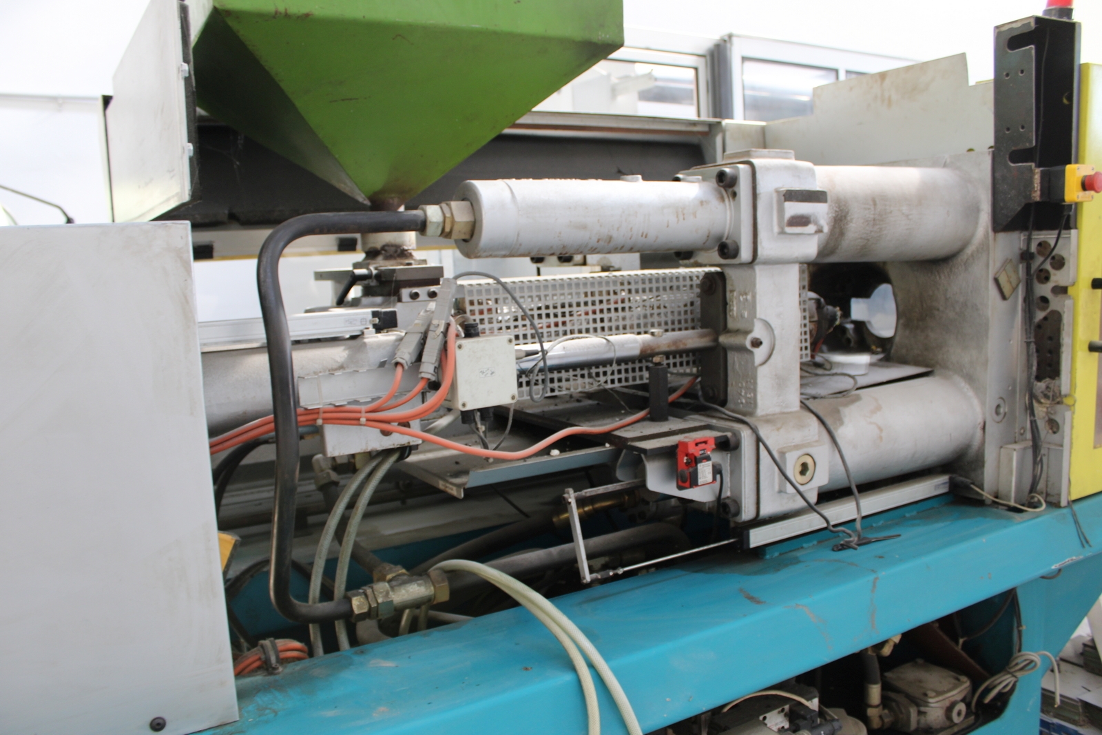 Injection molding machine 12