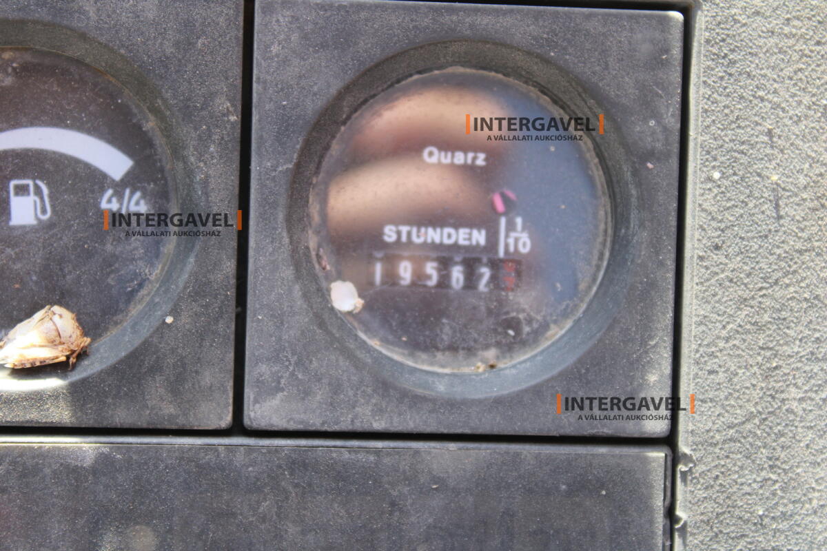 Gumikerekes forgó kotró - O&K 32