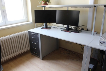 Desk with upper shelf and container